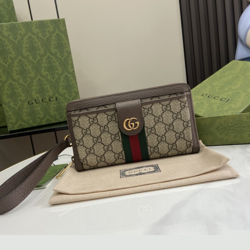 G*u*i clutch bags